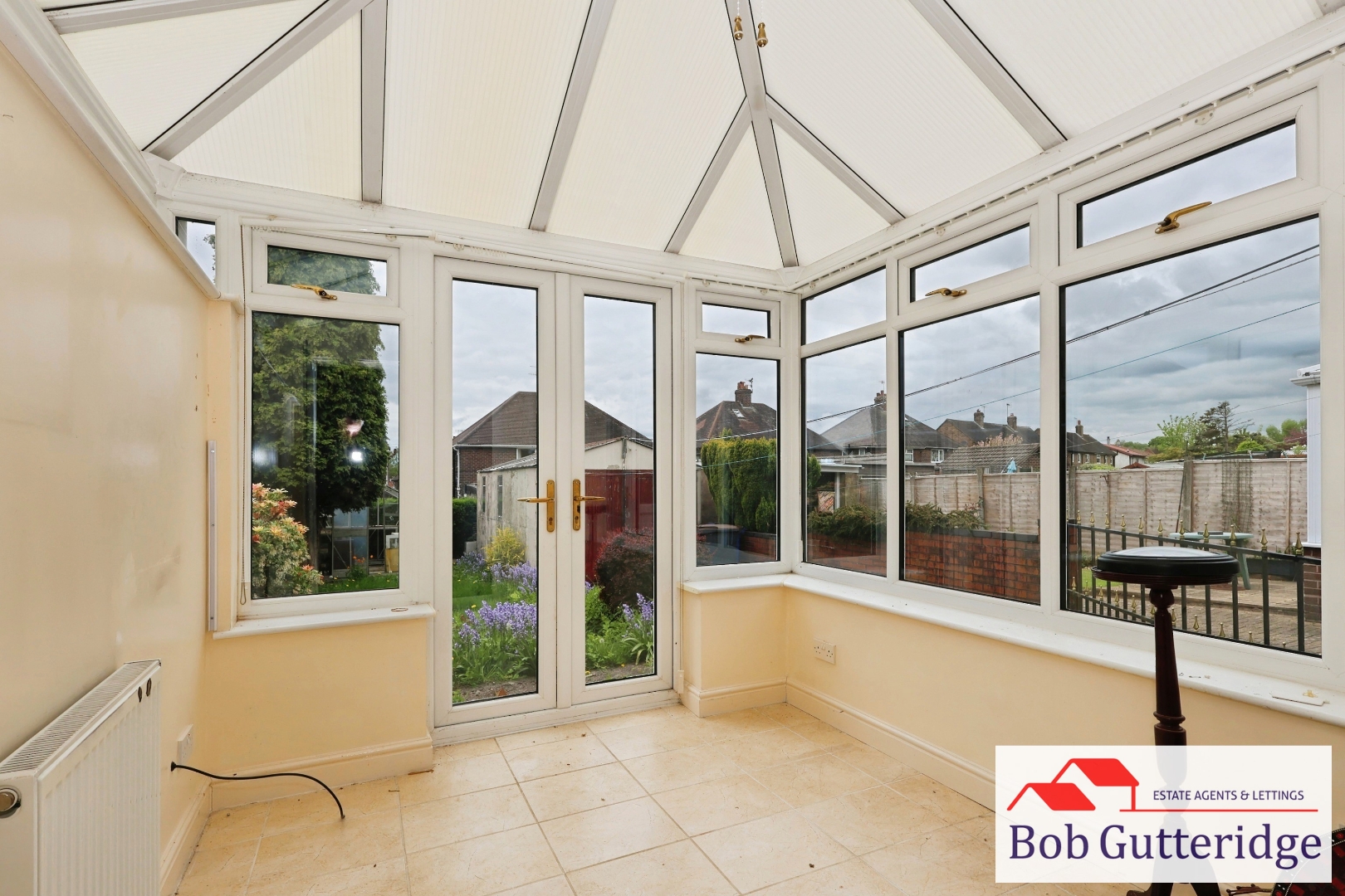 HALF BRICK & UPVC DOUBLE GLAZED CONSERVATORY
